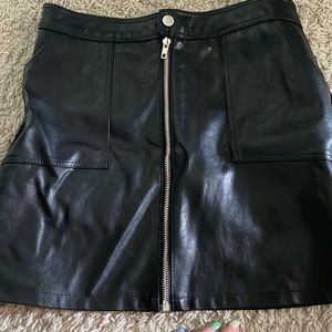 Super cute leather skirt, worn once, no tag on it. Silver zipper, pockets!